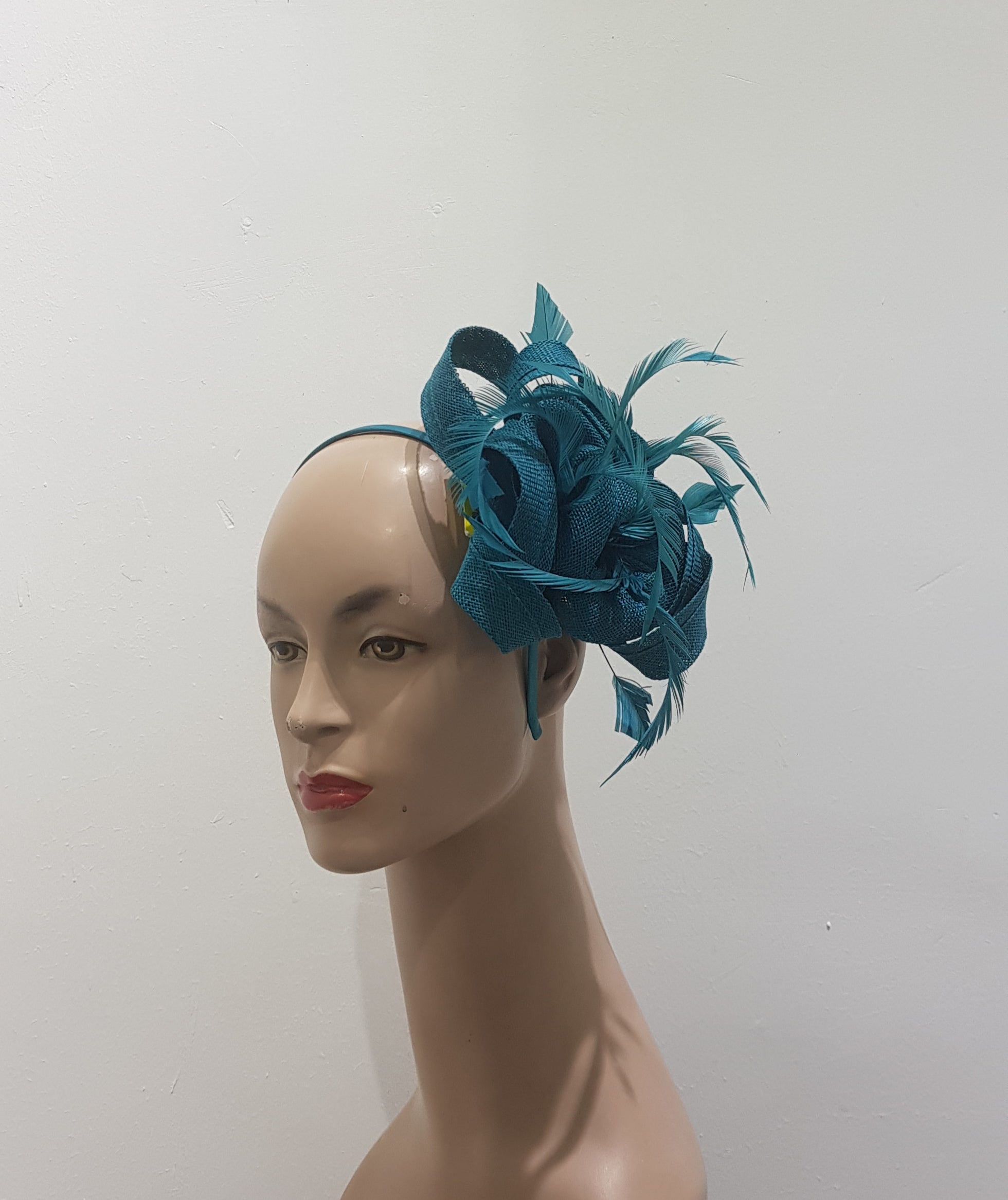 "Beautifully crafted headpiece available in 13 colors"