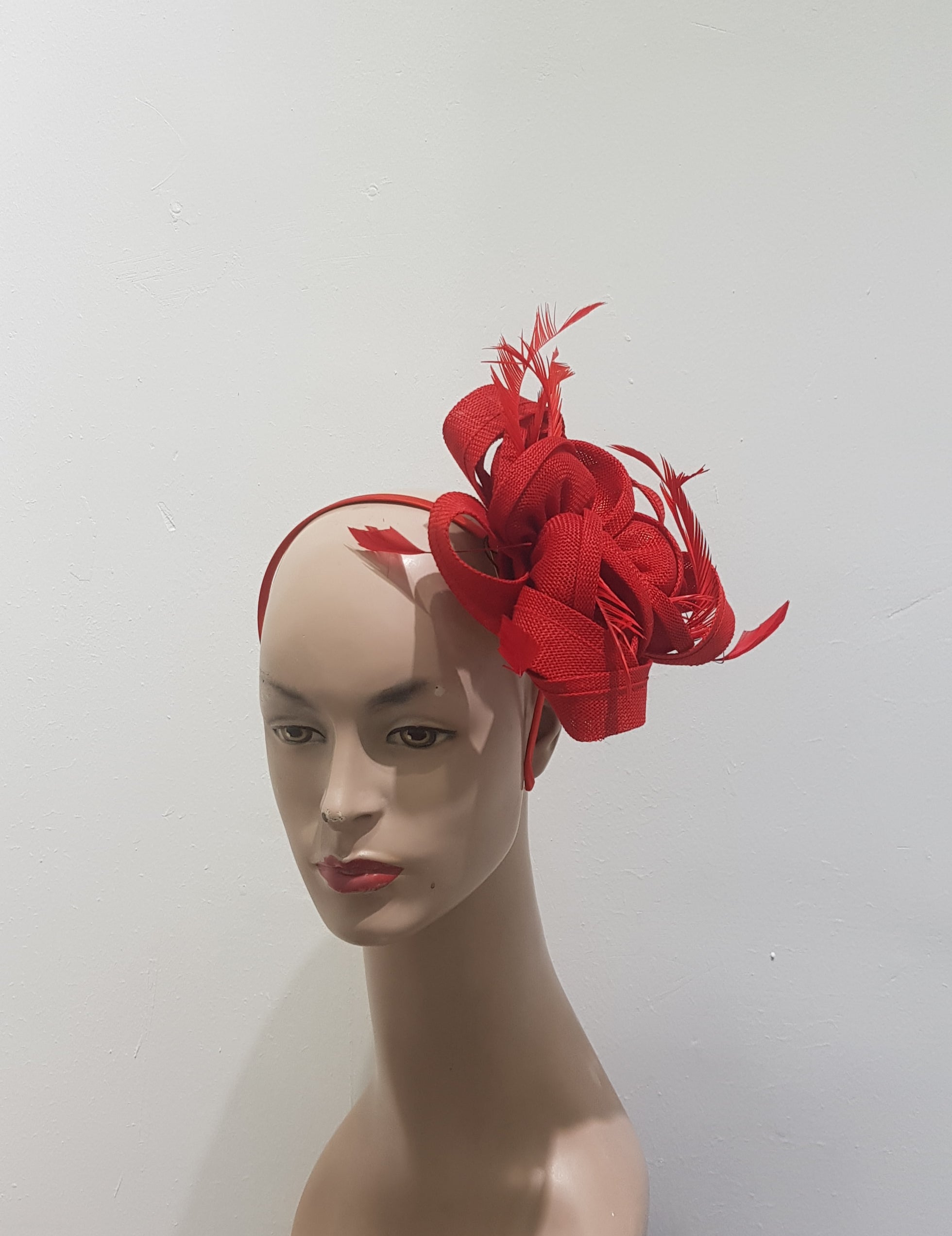 "Beautifully crafted headpiece available in 13 colors"