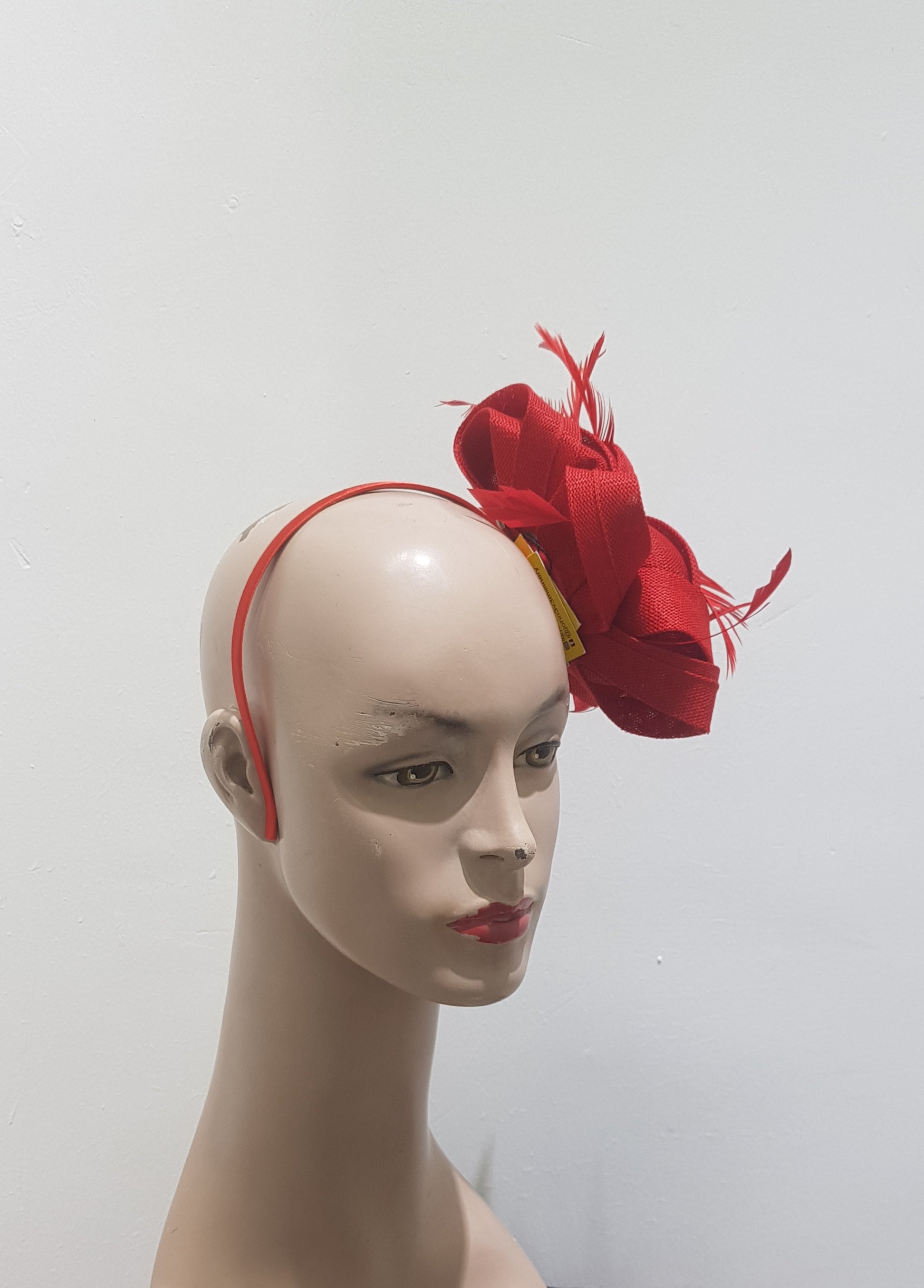 "Beautifully crafted headpiece available in 13 colors"