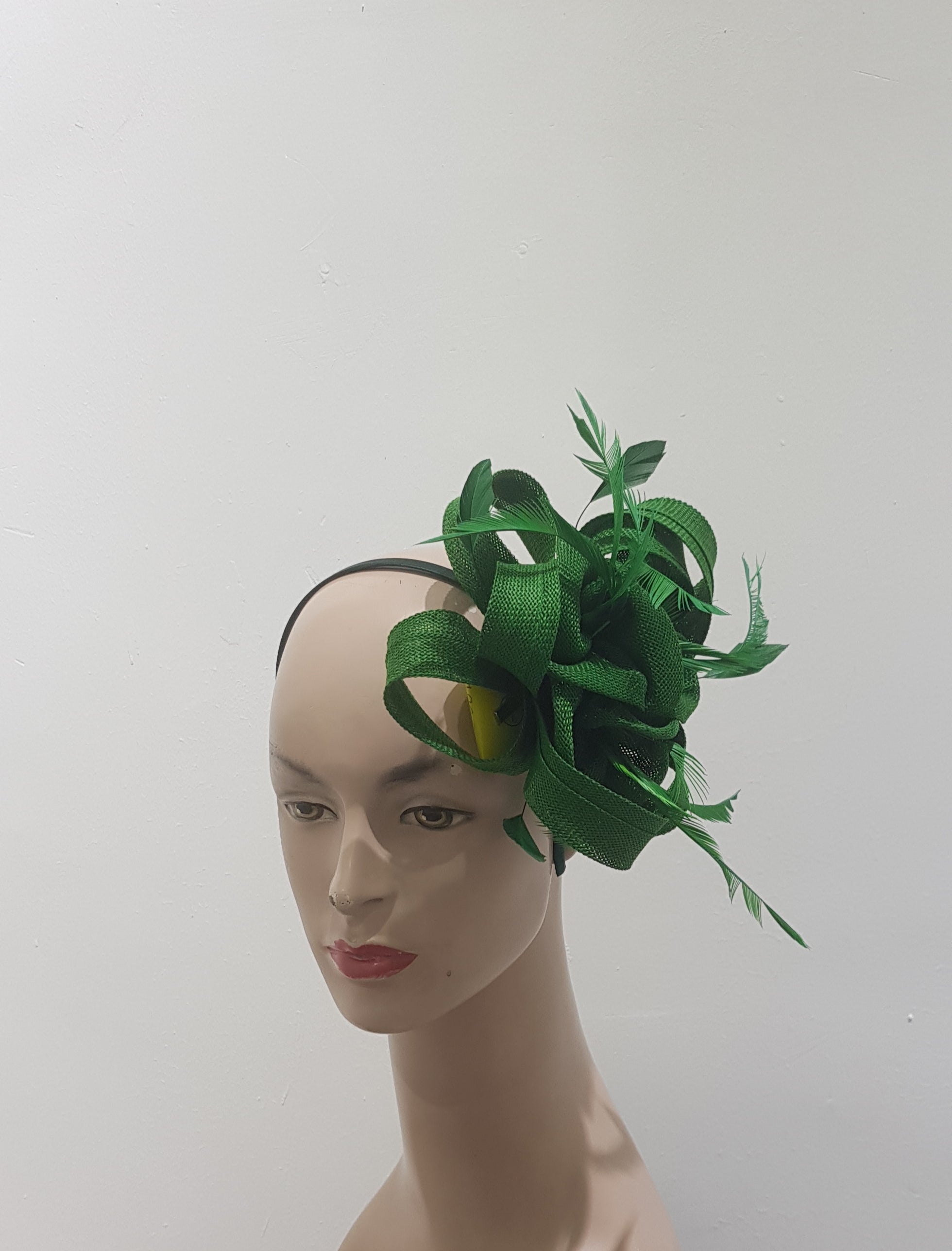 "Beautifully crafted headpiece available in 13 colors"