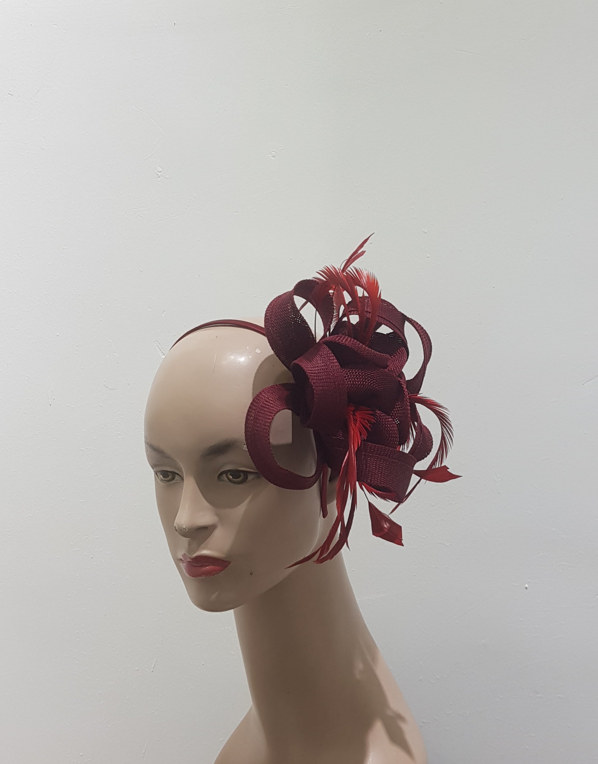 "Beautifully crafted headpiece available in 13 colors"