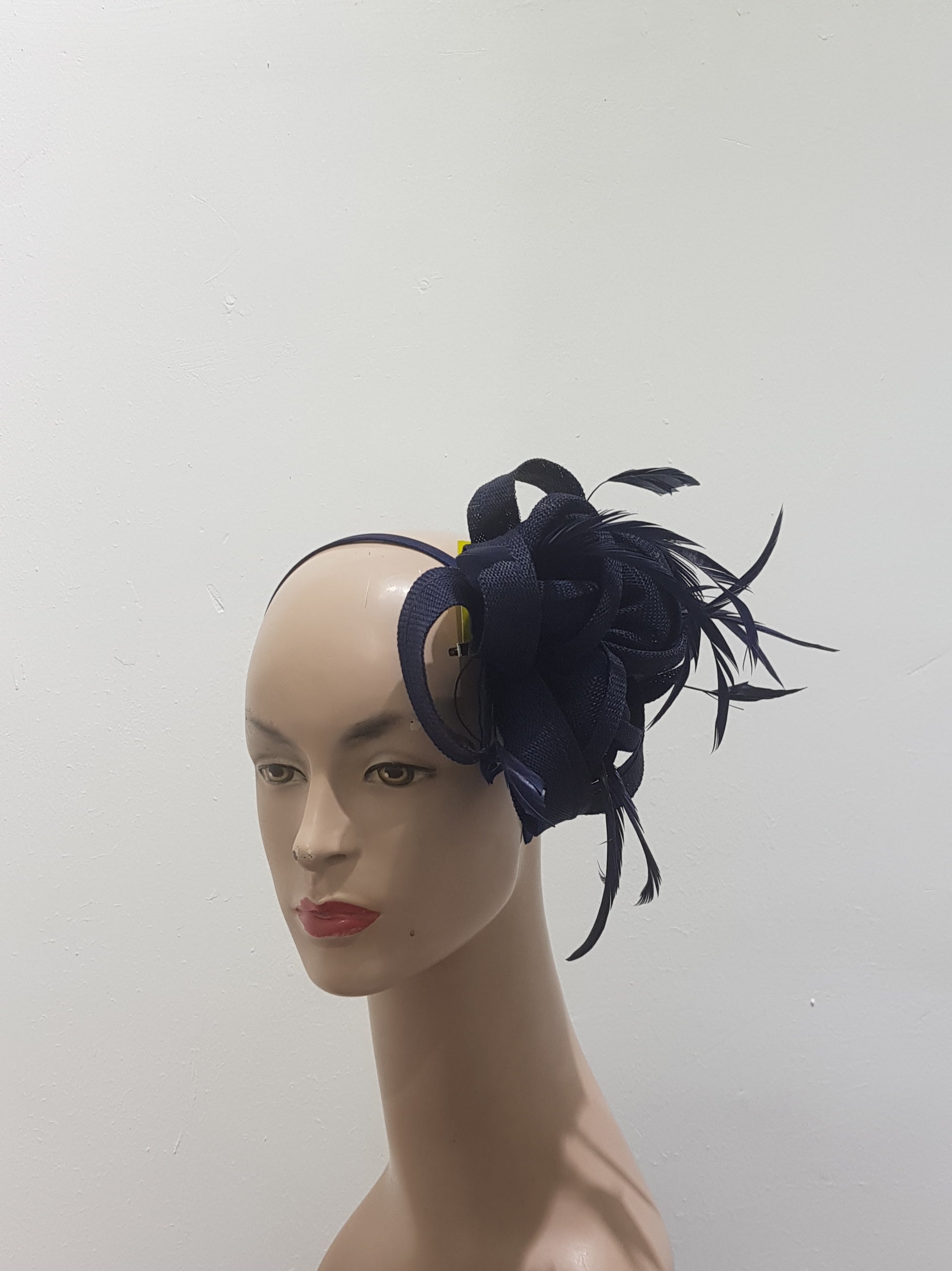 "Beautifully crafted headpiece available in 13 colors"