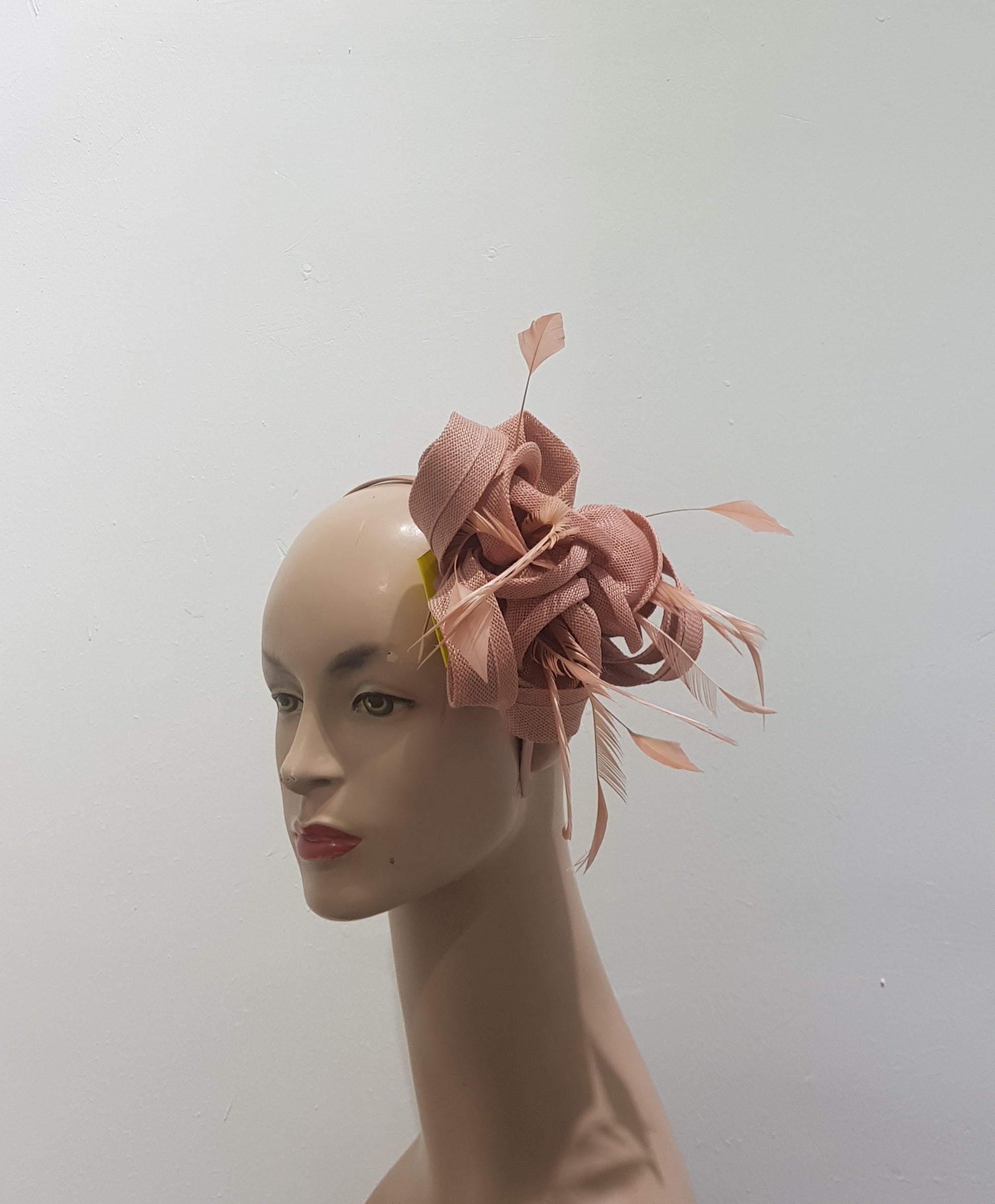 "Beautifully crafted headpiece available in 13 colors"