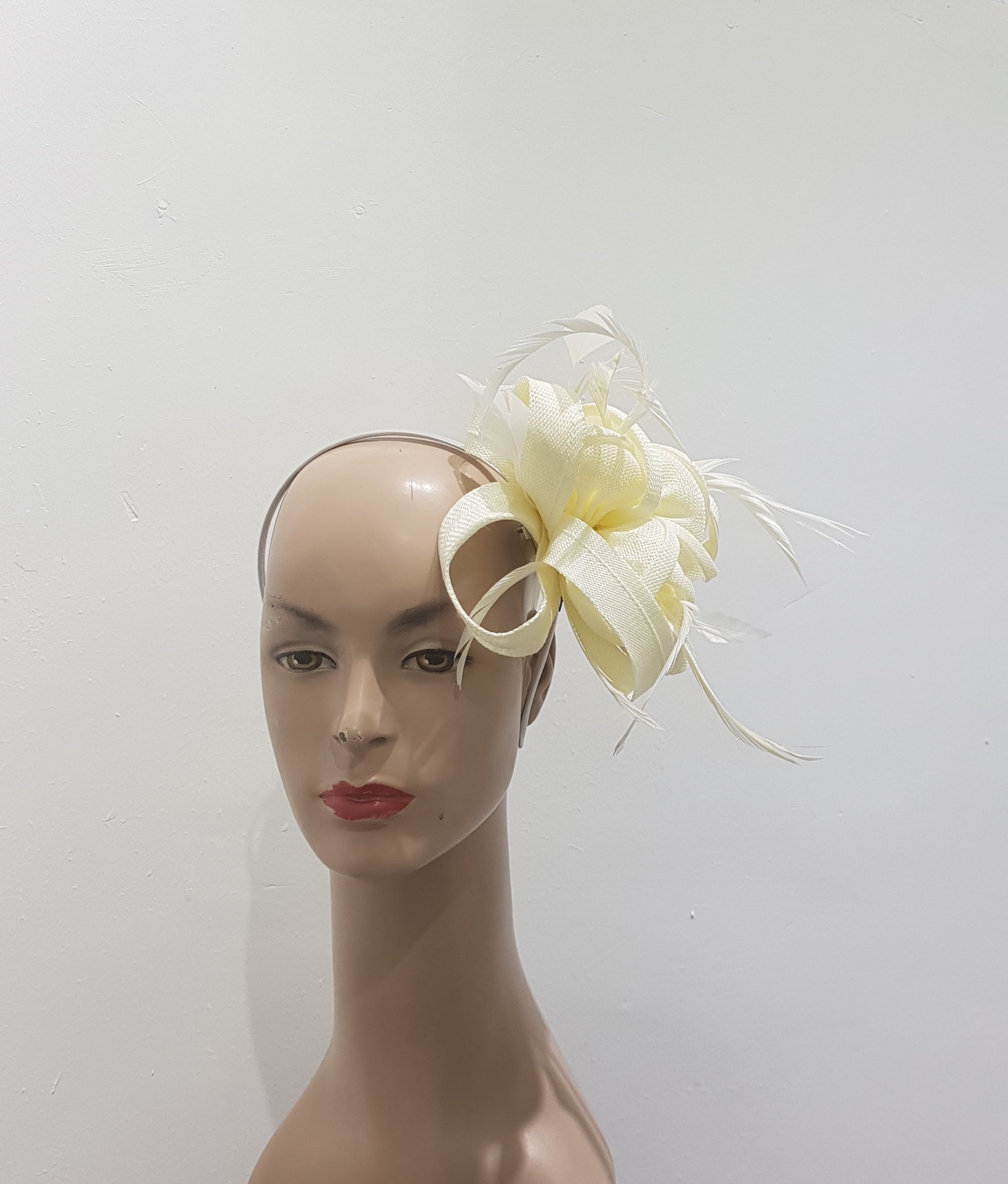 "Beautifully crafted headpiece available in 13 colors"