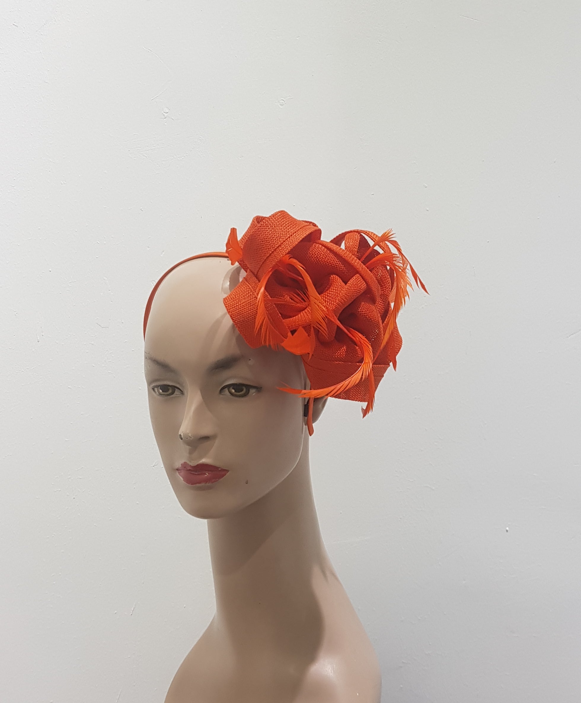 "Beautifully crafted headpiece available in 13 colors"