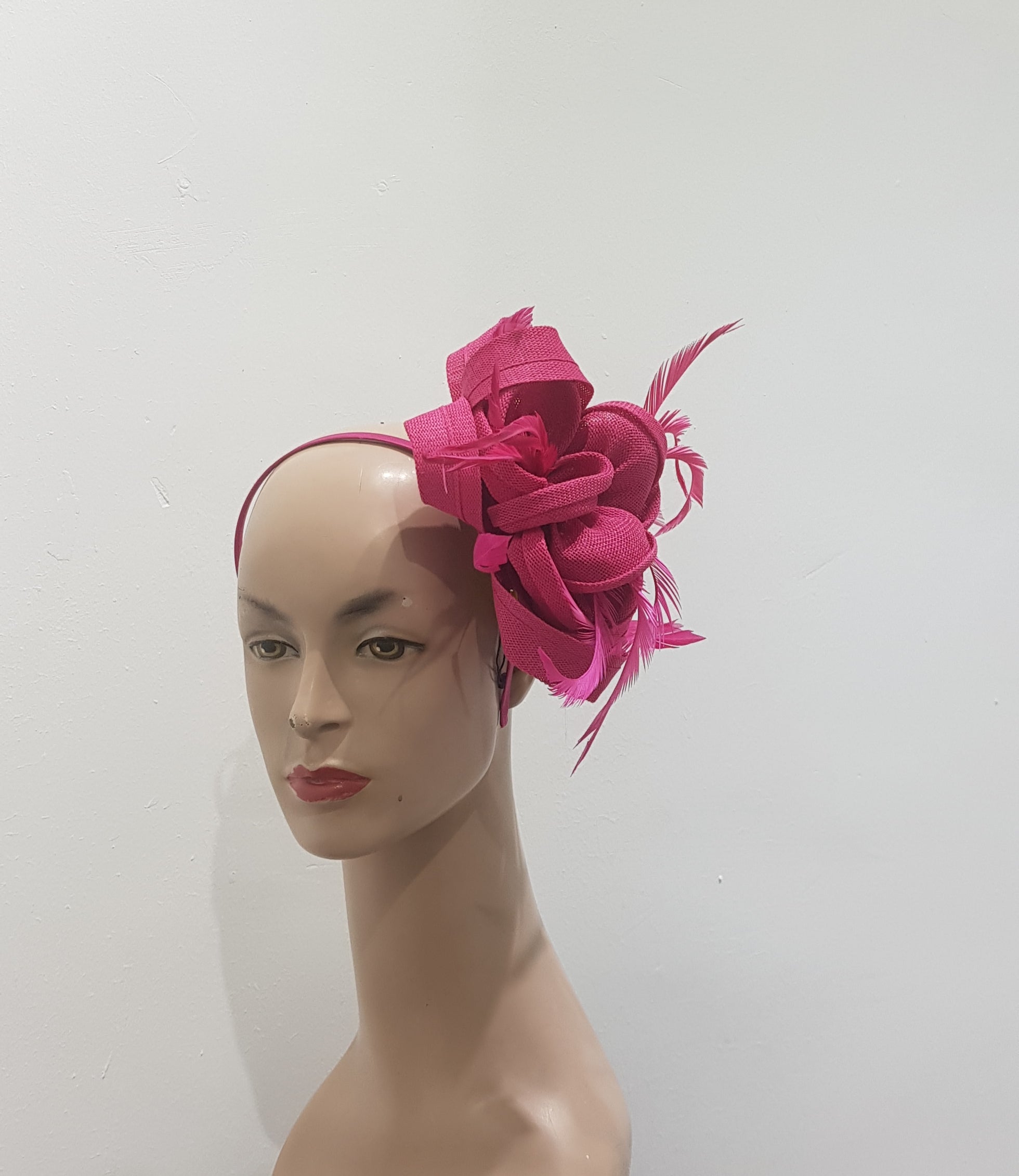 "Beautifully crafted headpiece available in 13 colors"