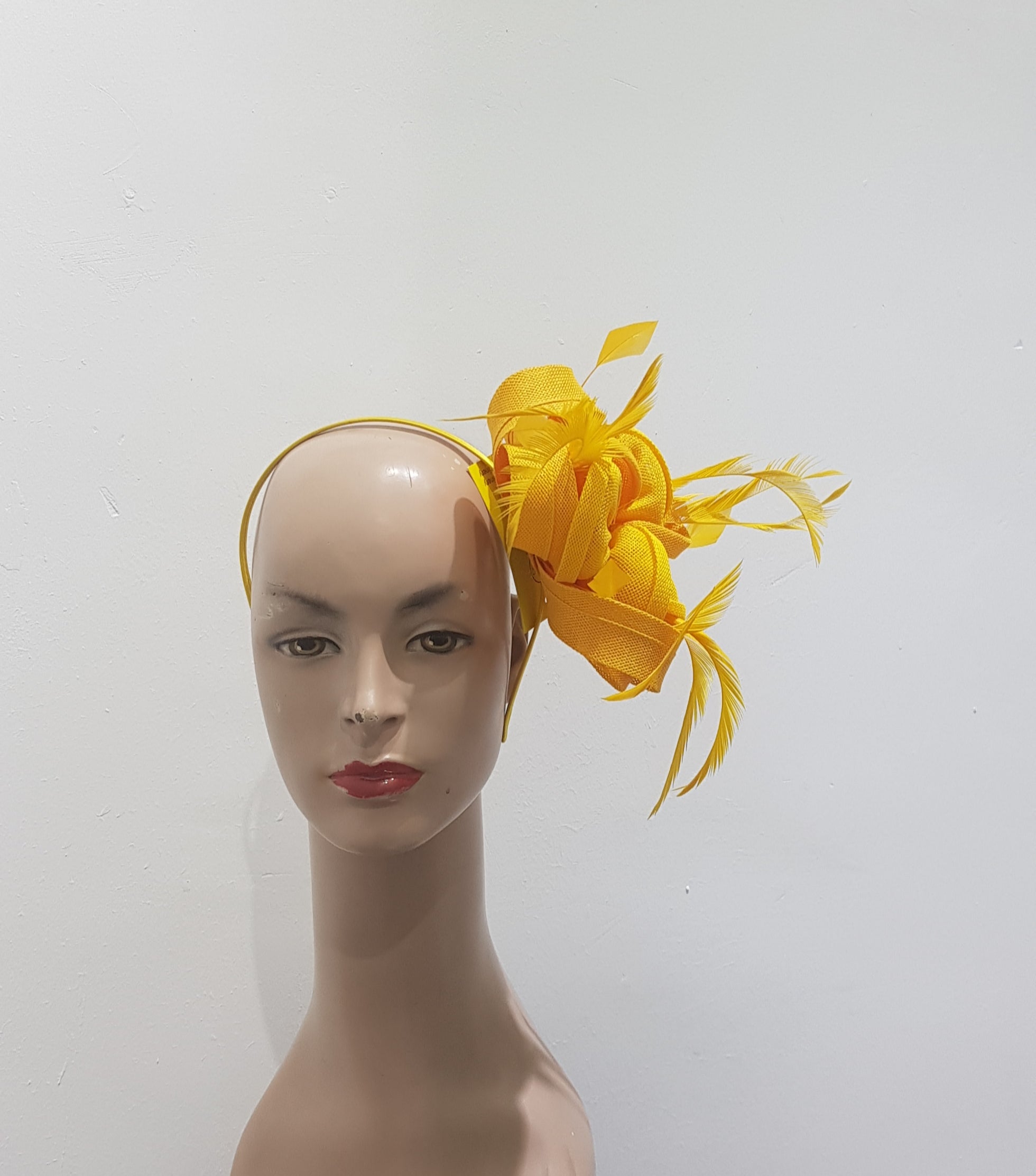 "Beautifully crafted headpiece available in 13 colors"