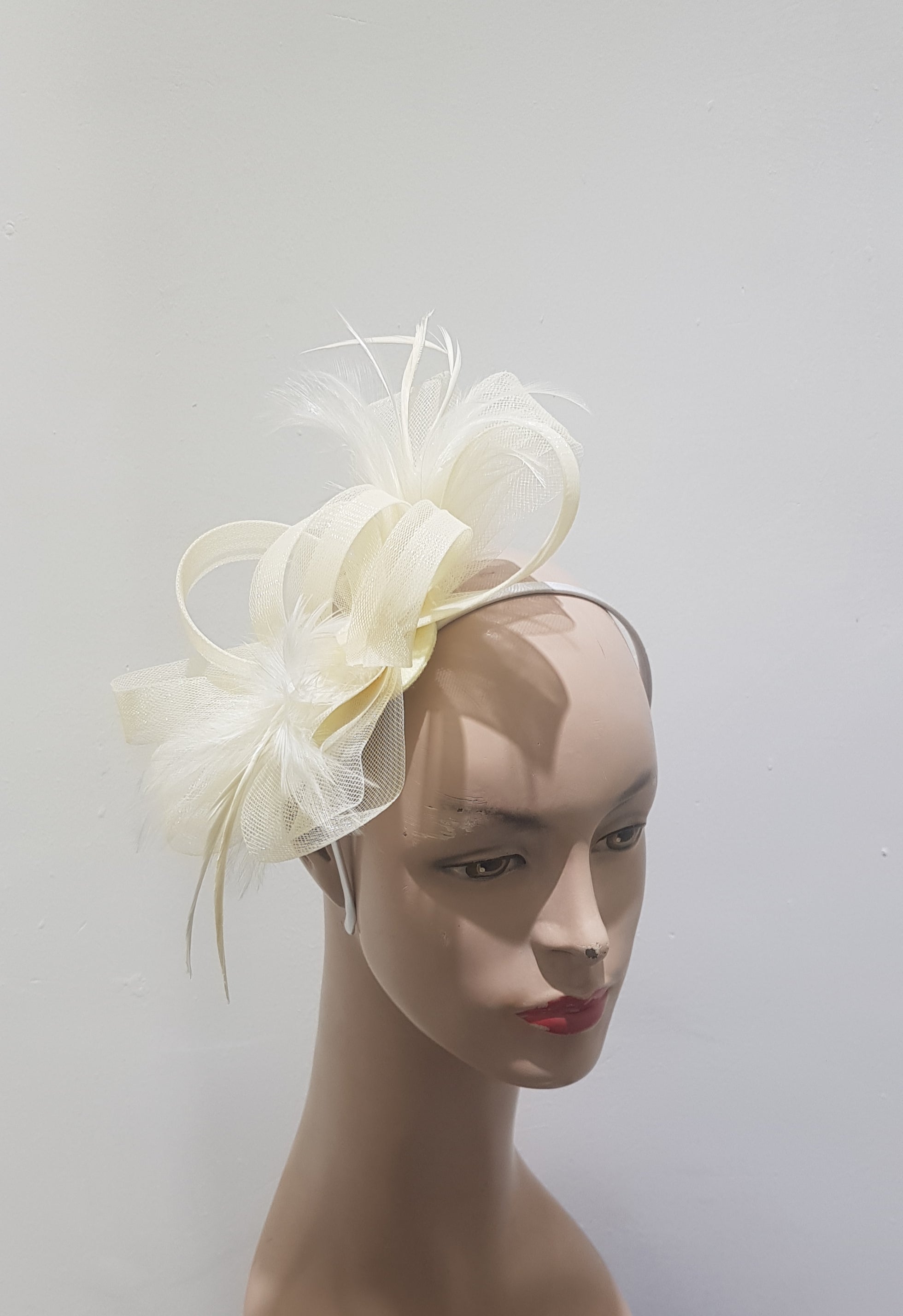 "Elegant Crin & feather fascinator"