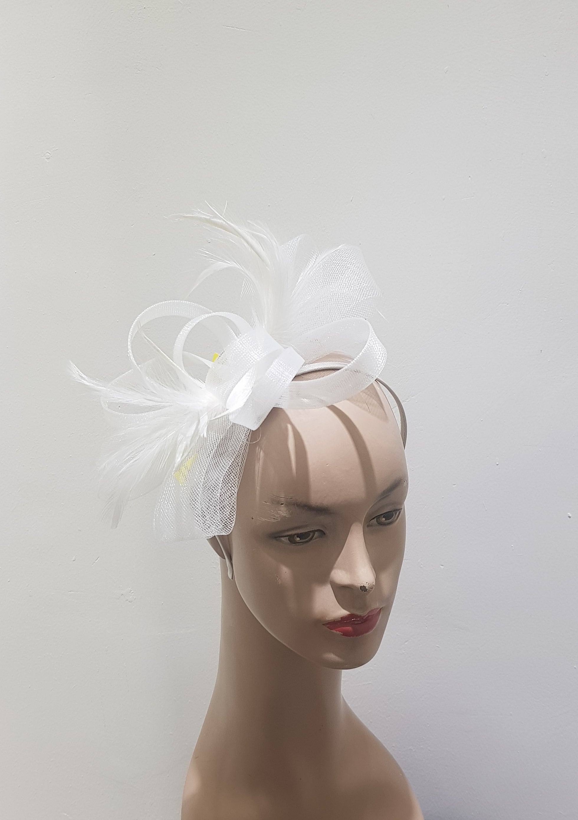 "Elegant Crin & feather fascinator"