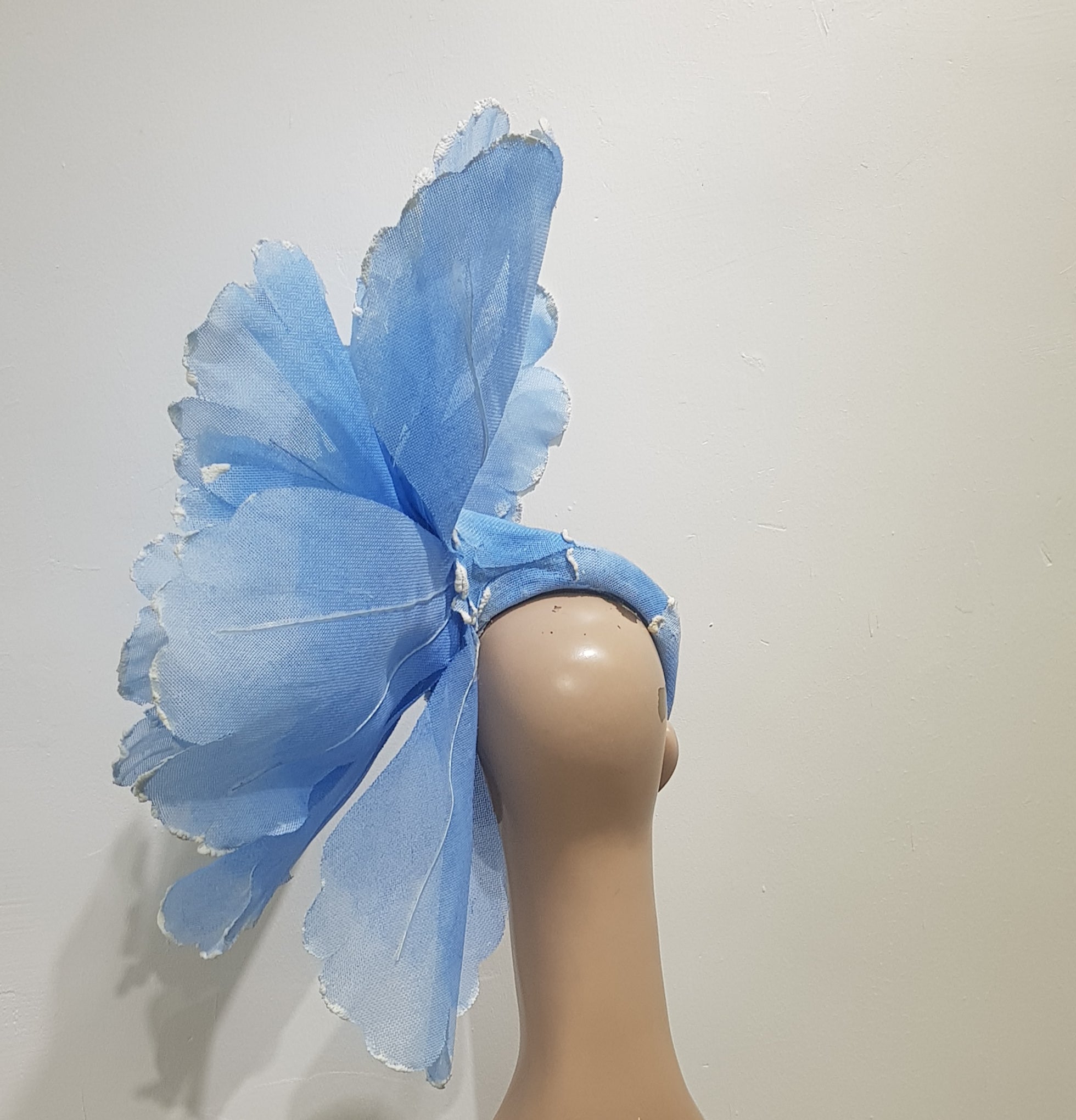 Blooming Elegance: Sky-Blue Floral Fascinator