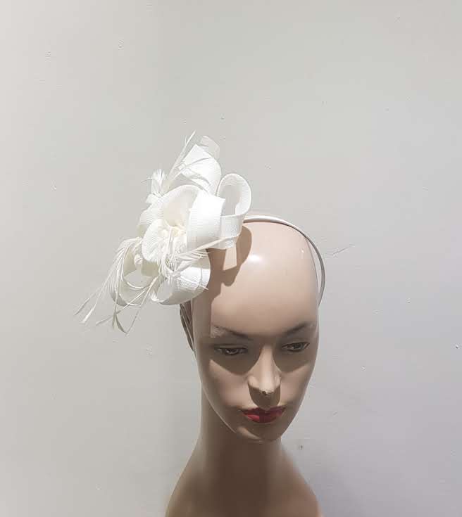 "Beautifully crafted headpiece available in 13 colors"