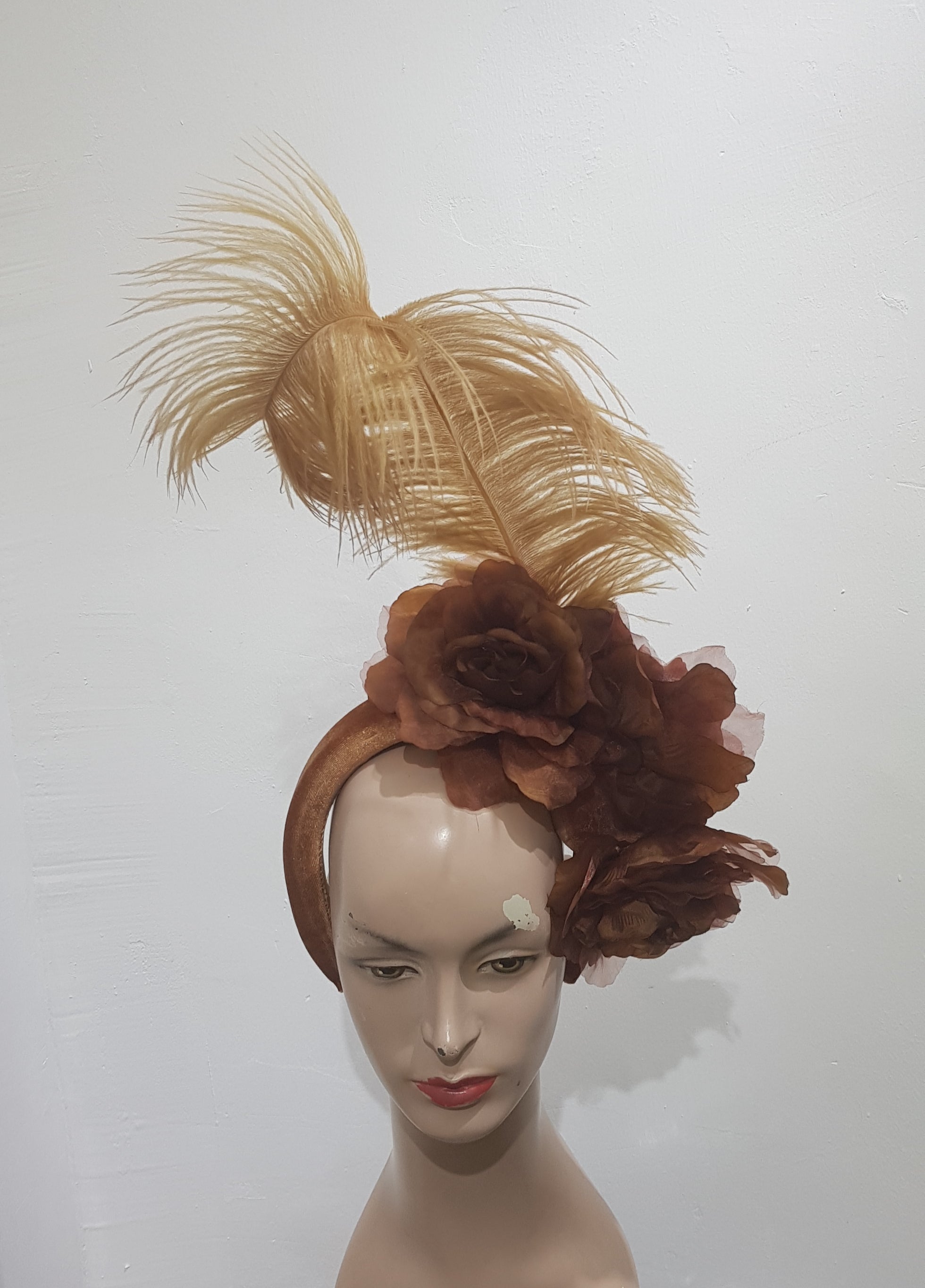 Floral Elegance Fascinator Collection with Vibrant Feather Adornments