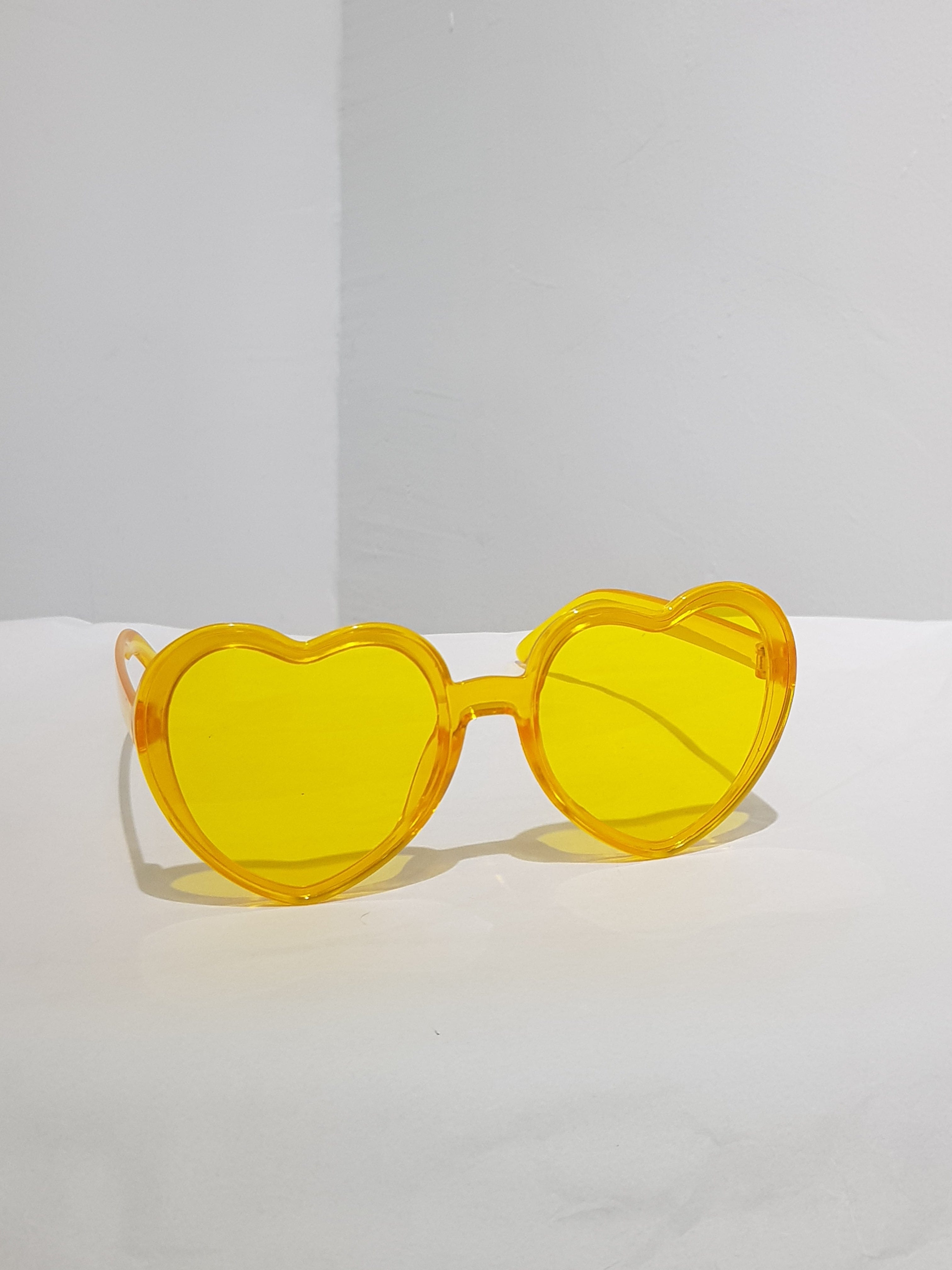 Playful Heart-Shaped Colorful Sunglasses Collection