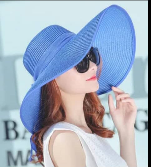 "Elegant, large straw hat with a band and bow for all your summer days"