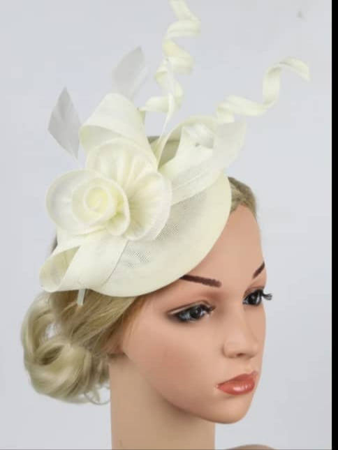 "Elegant sinamay-like feathered fascinator"