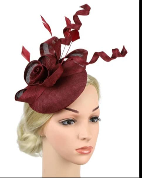 "Elegant sinamay-like feathered fascinator"