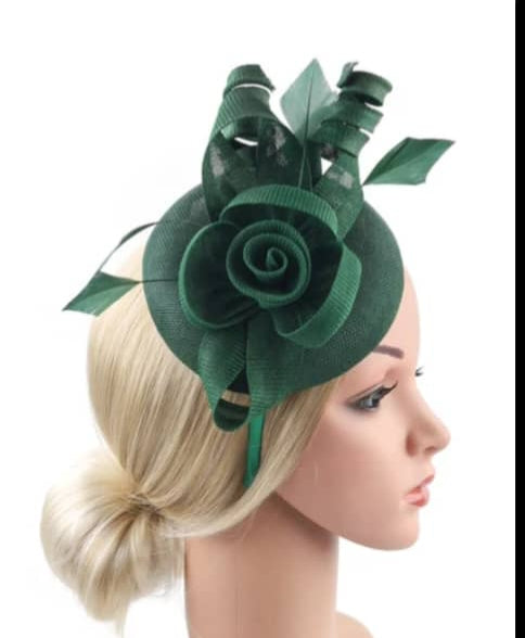 "Elegant sinamay-like feathered fascinator"