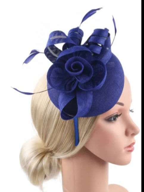 "Elegant sinamay-like feathered fascinator"