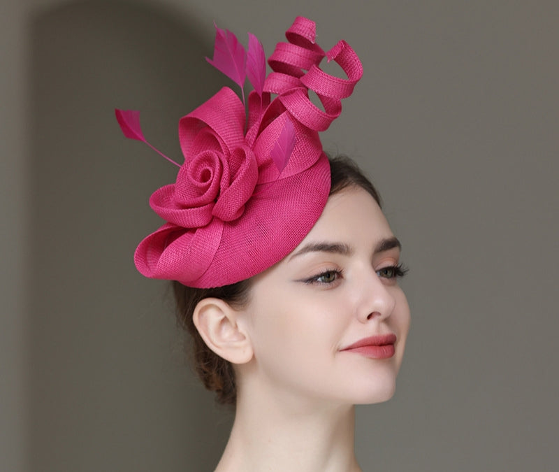 "Elegant sinamay-like feathered fascinator"