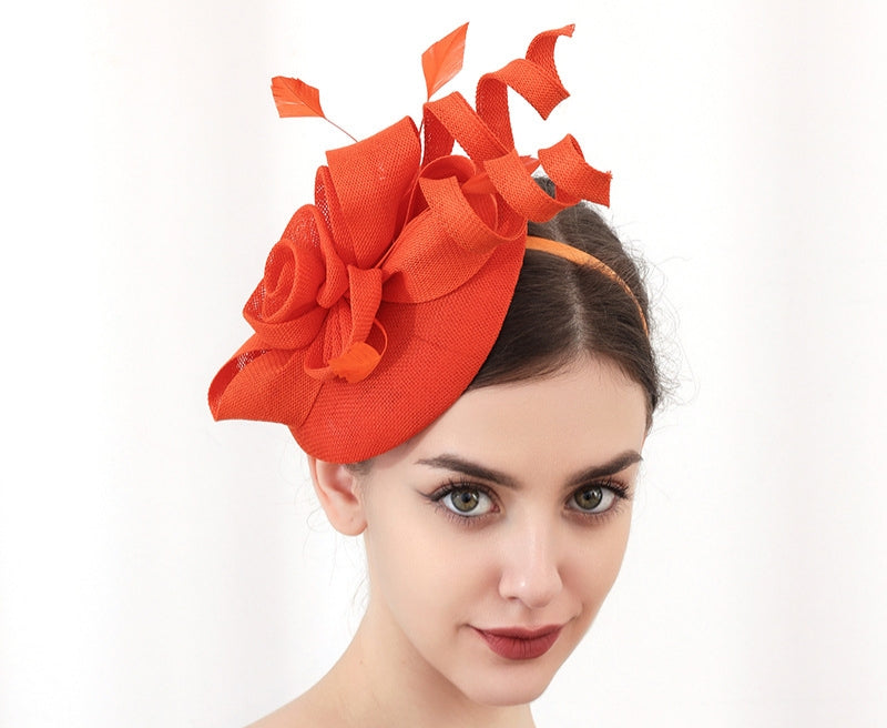 "Elegant sinamay-like feathered fascinator"