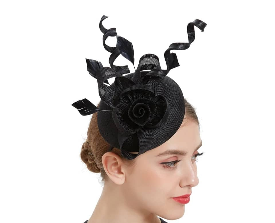 "Elegant sinamay-like feathered fascinator"