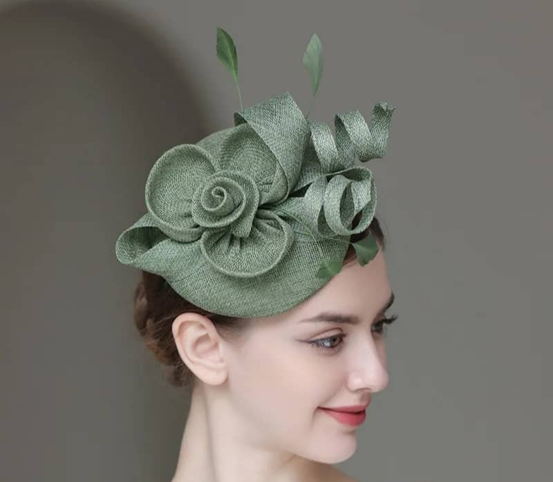 "Elegant sinamay-like feathered fascinator"