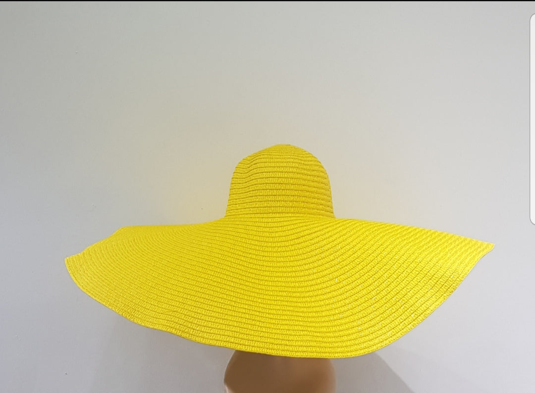 Glamorous Extra large, blocked straw hat for all your summer outings.