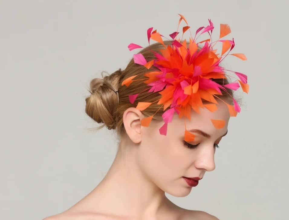 Feather fascinator on hair comb