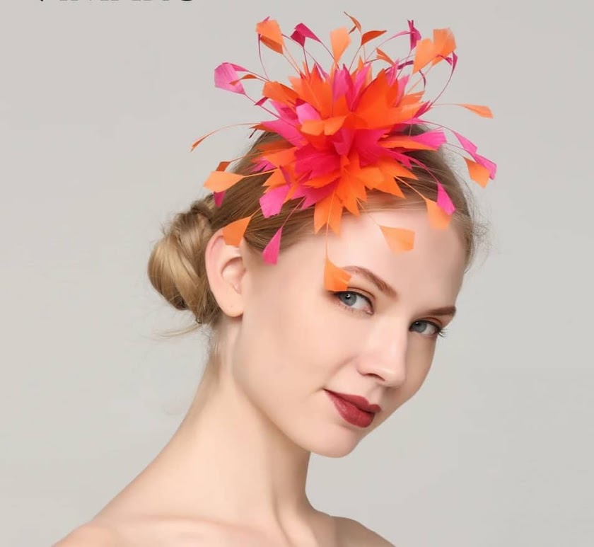 Feather fascinator on hair comb