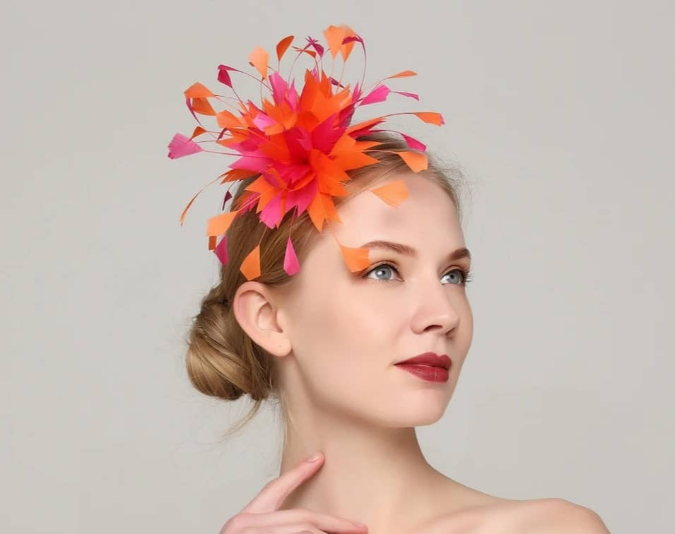 Feather fascinator on hair comb