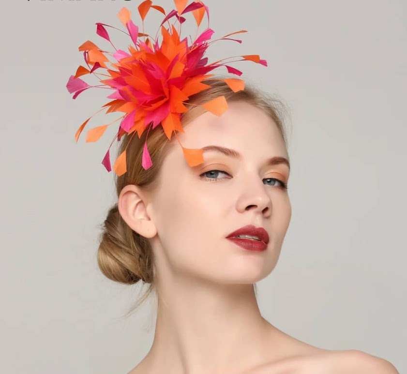 Feather fascinator on hair comb