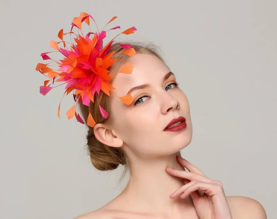 Feather fascinator on hair comb