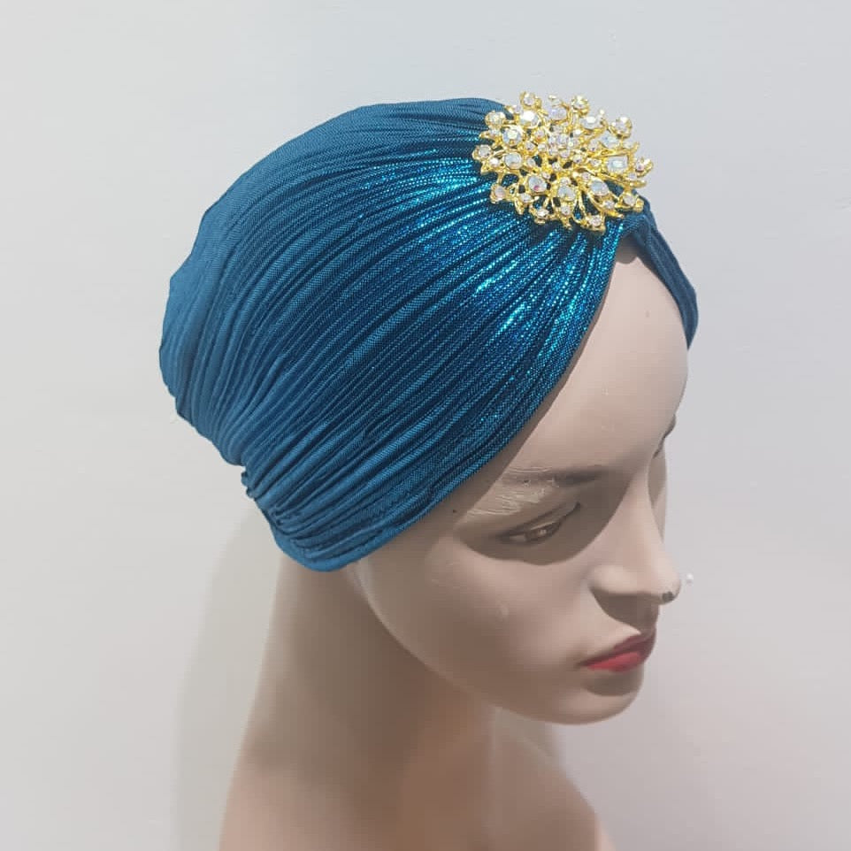 "Sapphire and Gold Pleated Turbans with Crystal Embellishments"