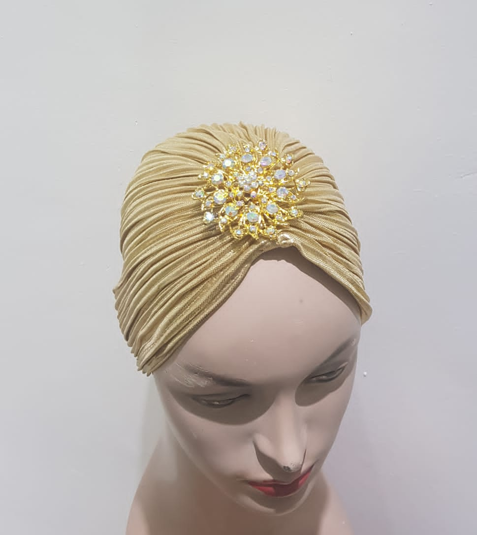 "Sapphire and Gold Pleated Turbans with Crystal Embellishments"