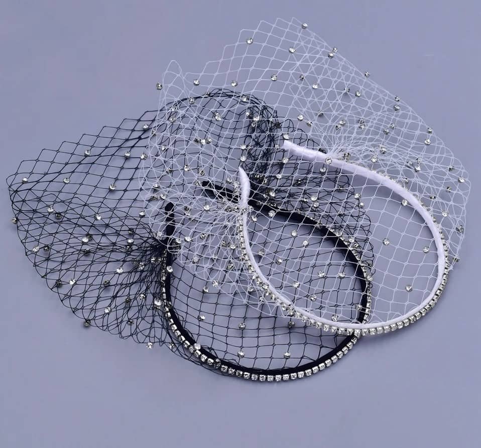 "Elegant headband with Rhinestone veiling."