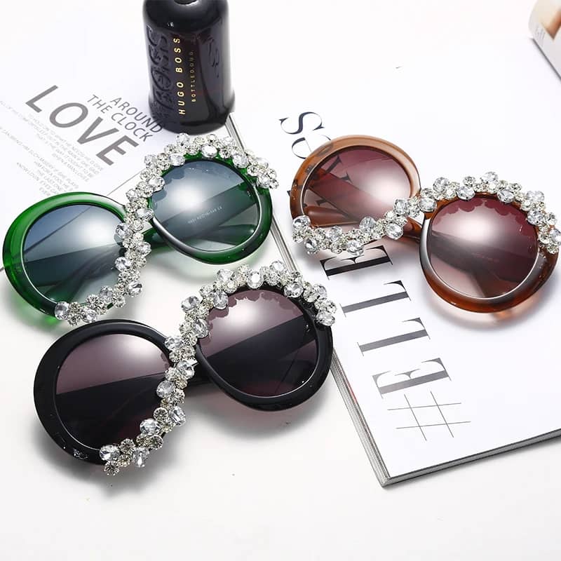 Fashion forward oversized round sunglasses with diamond-like stones