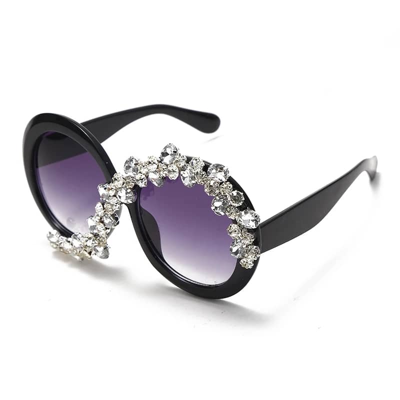 Fashion forward oversized round sunglasses with diamond-like stones