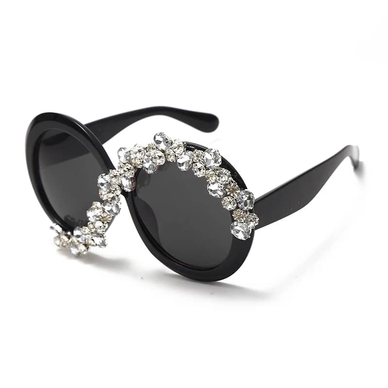 Fashion forward oversized round sunglasses with diamond-like stones