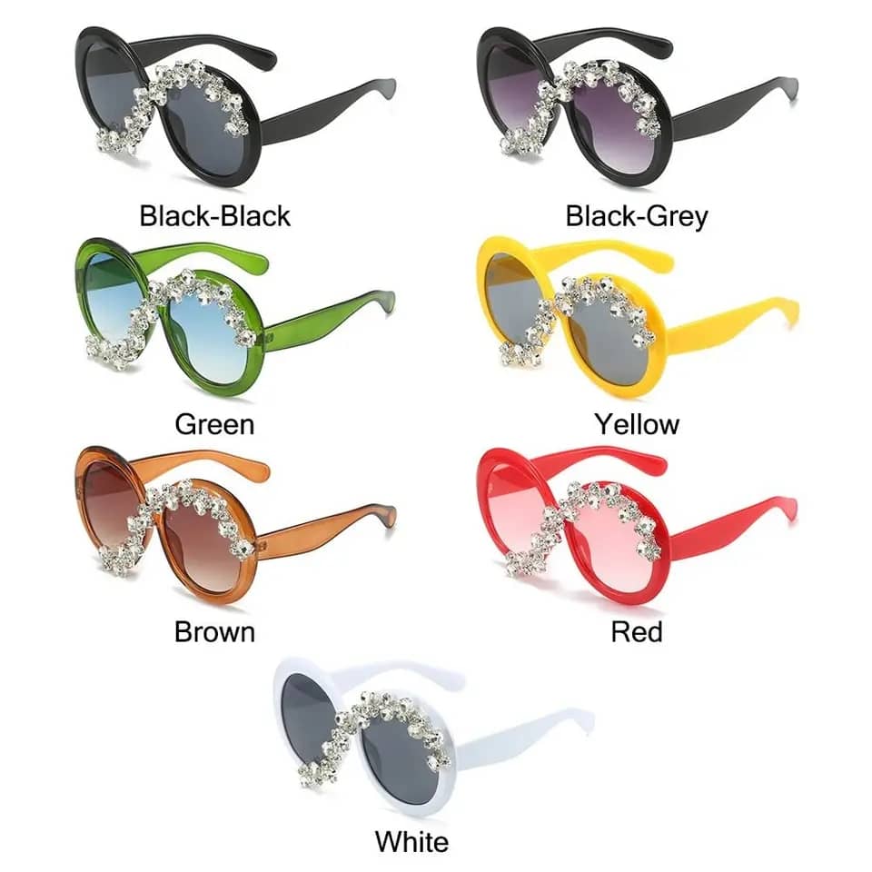 Fashion forward oversized round sunglasses with diamond-like stones