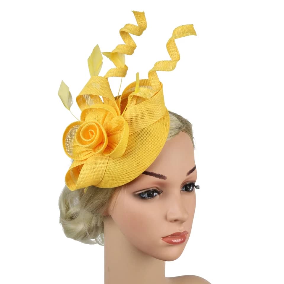 "Elegant sinamay-like feathered fascinator"