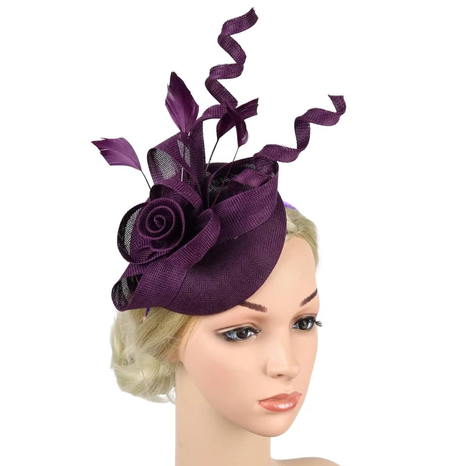 "Elegant sinamay-like feathered fascinator"