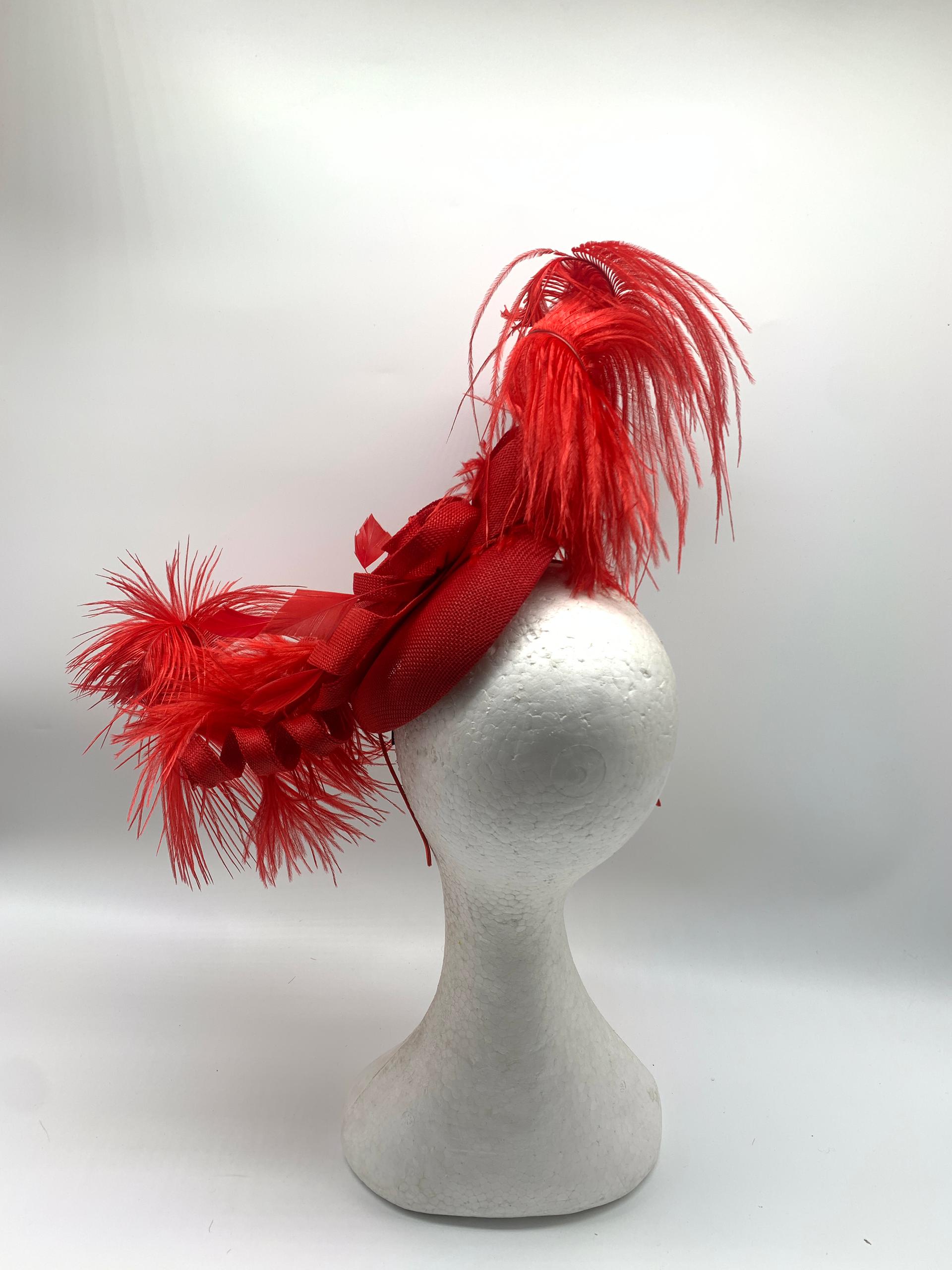 Elegant sinamay-like feathered fascinator