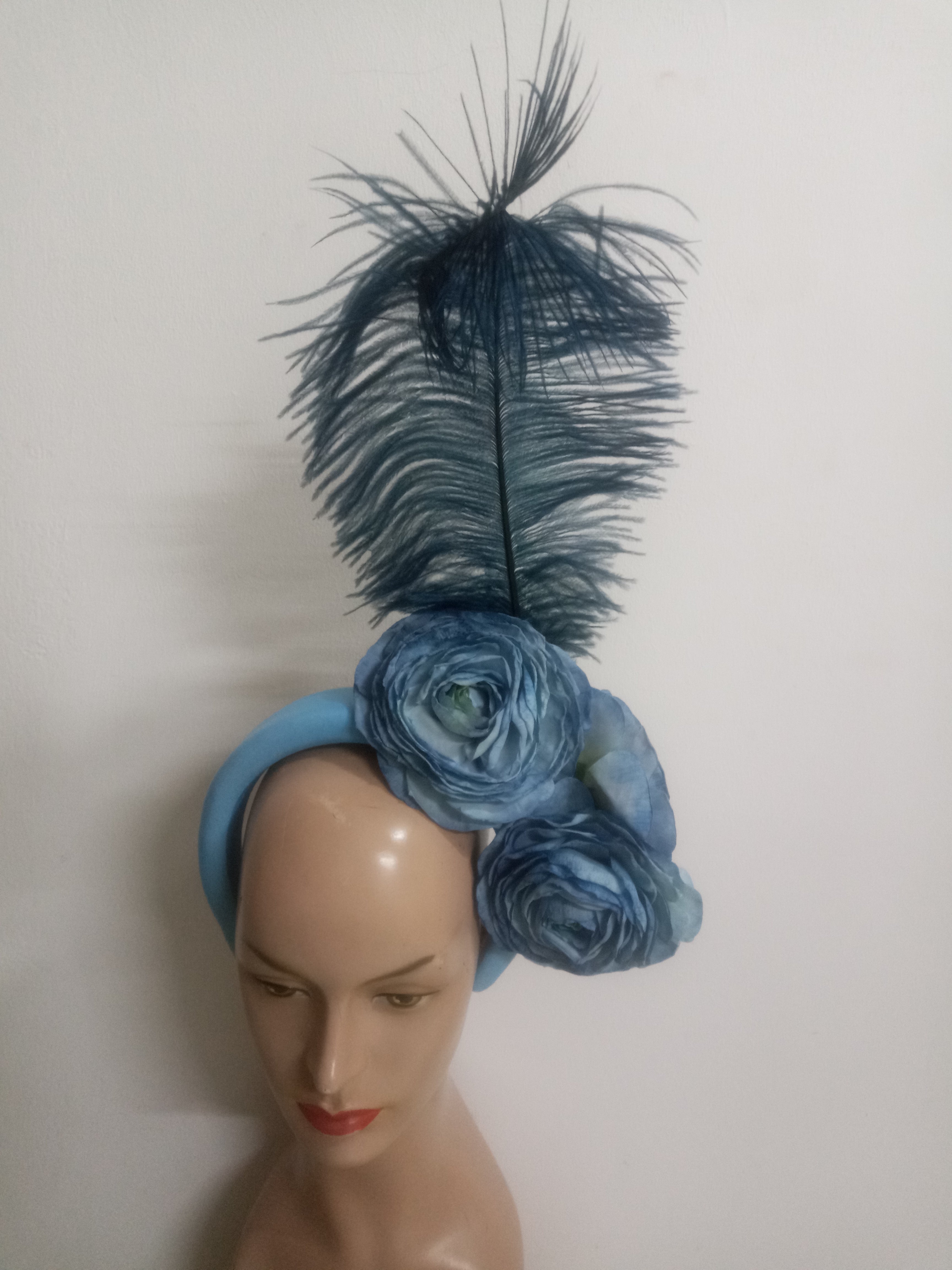 Floral Elegance Fascinator Collection with Vibrant Feather Adornments