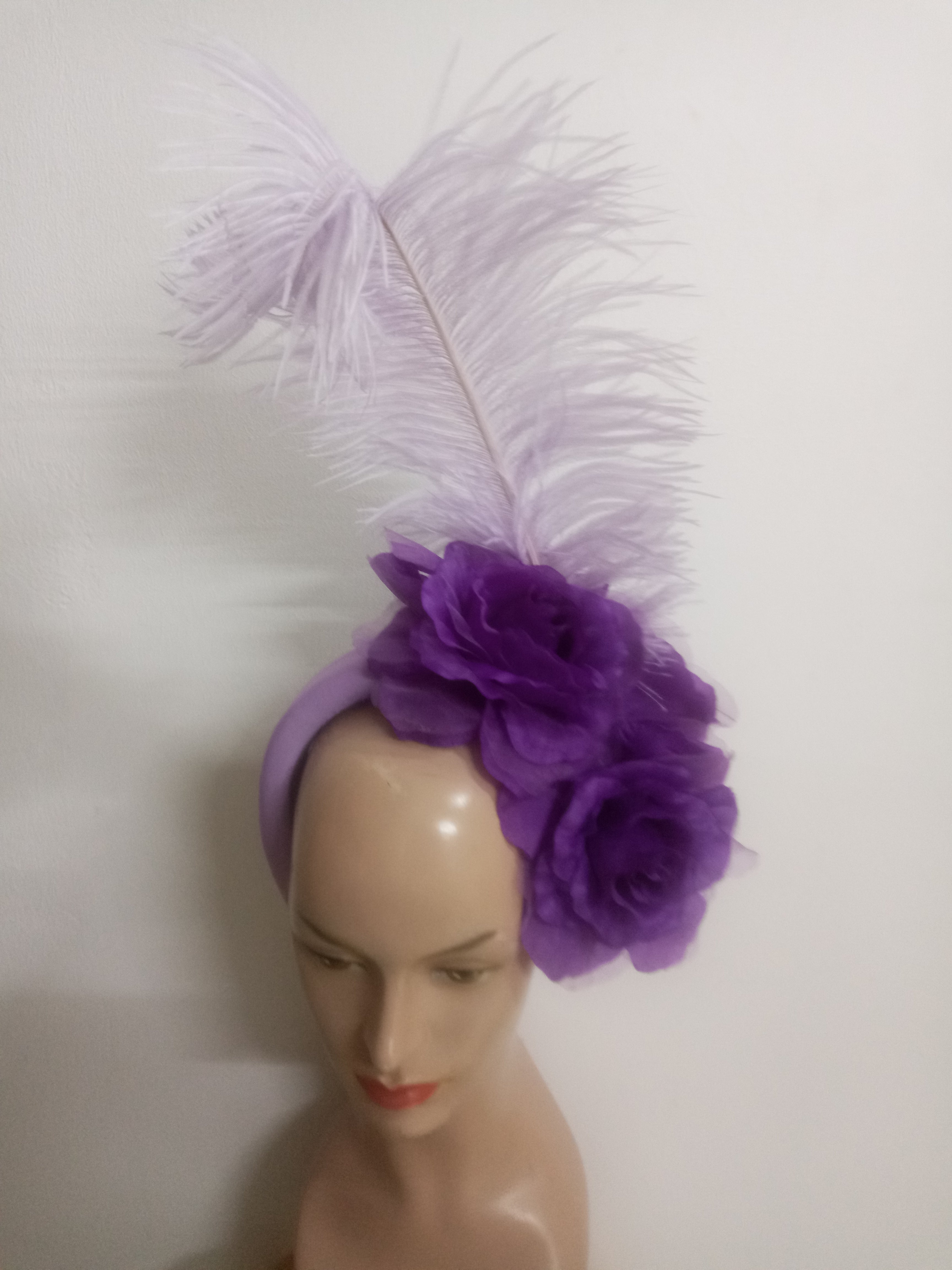 Floral Elegance Fascinator Collection with Vibrant Feather Adornments