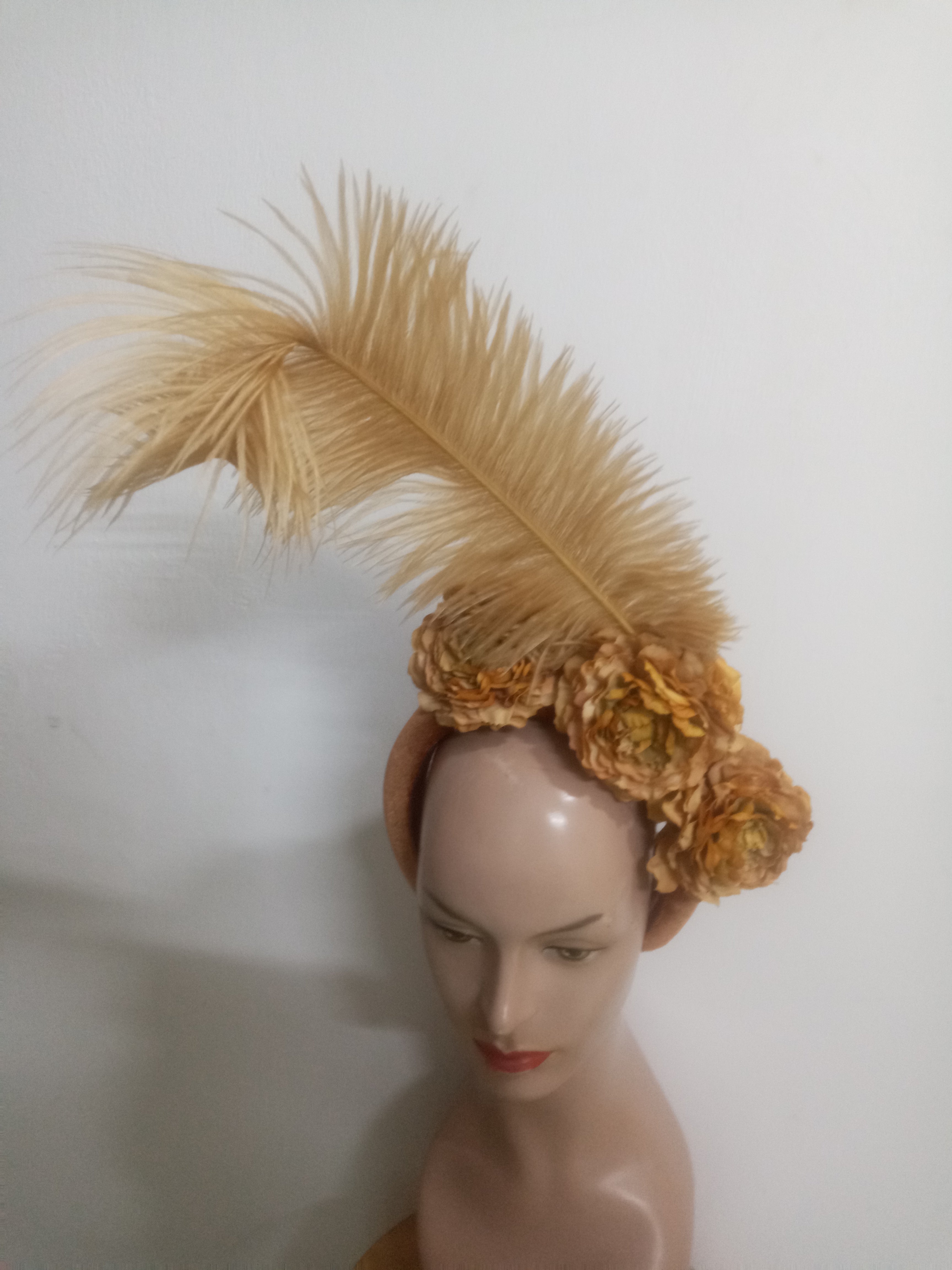 Floral Elegance Fascinator Collection with Vibrant Feather Adornments